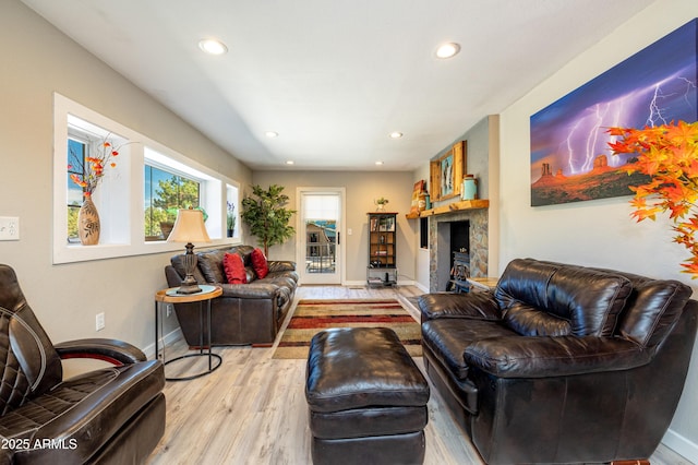 living room with light hardwood / wood-style flooring