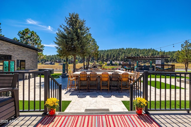 view of patio / terrace featuring exterior bar