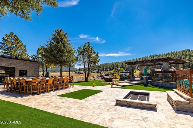 view of patio with a bar