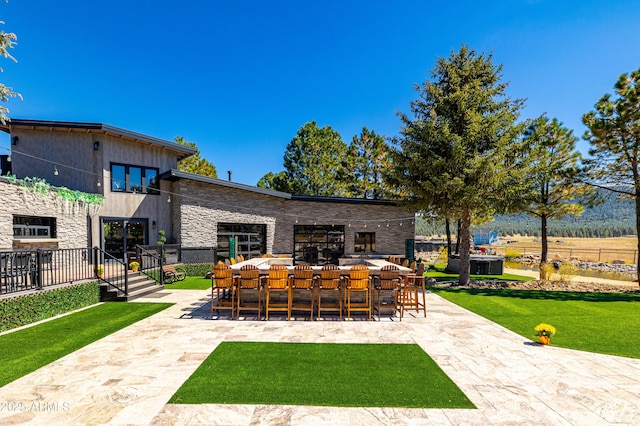 view of patio featuring a bar