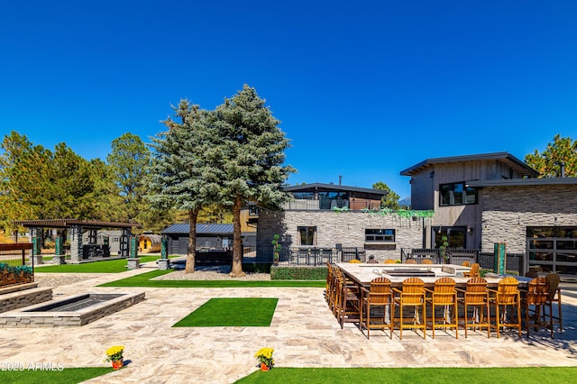 exterior space with a bar and a gazebo