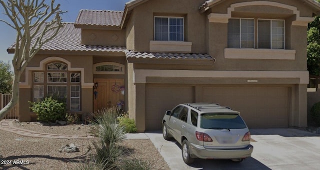 view of front of home featuring a garage