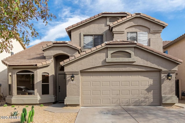 20929 N 37th Way, Phoenix, AZ 85050 - mediterranean / spanish home featuring a tile roof, concrete driveway, and stucco siding