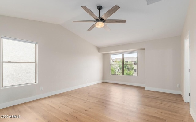 20929 N 37th Way, Phoenix, AZ 85050 - spare room featuring vaulted ceiling, a ceiling fan, light wood-type flooring, and baseboards