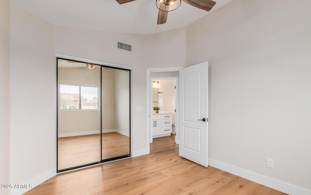 20929 N 37th Way, Phoenix, AZ 85050 - unfurnished bedroom with light wood finished floors, a closet, baseboards, and a ceiling fan