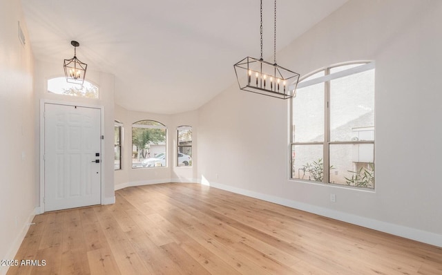 20929 N 37th Way, Phoenix, AZ 85050 - foyer featuring a chandelier, light wood finished floors, baseboards, and lofted ceiling