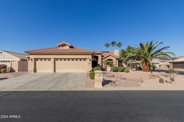 view of front of property with a garage