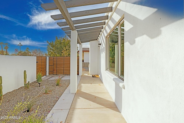 view of patio featuring a pergola