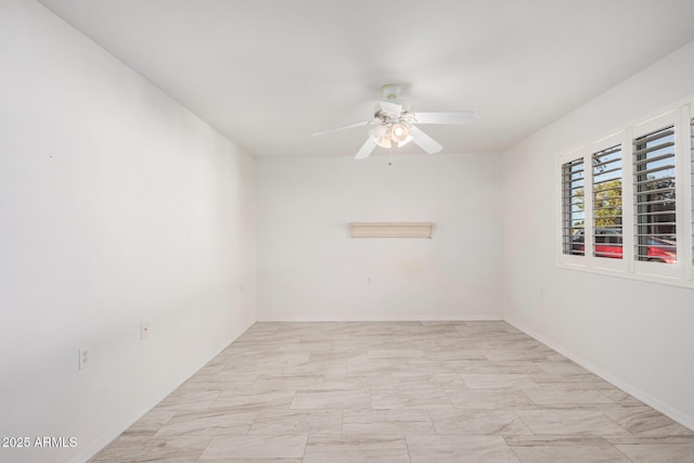 unfurnished room featuring ceiling fan