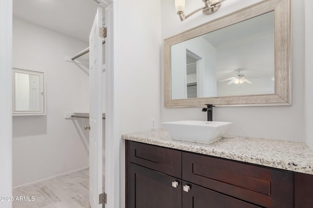 bathroom with vanity and ceiling fan