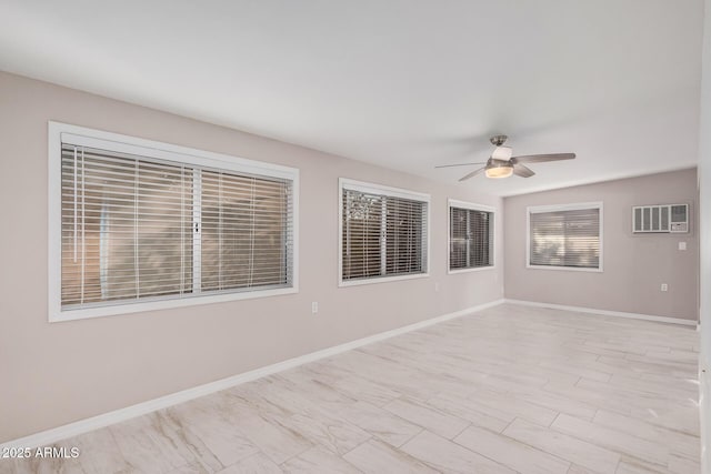 unfurnished room with ceiling fan