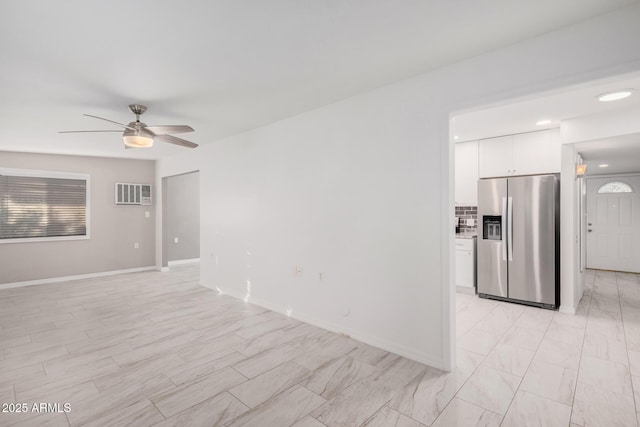 spare room featuring ceiling fan