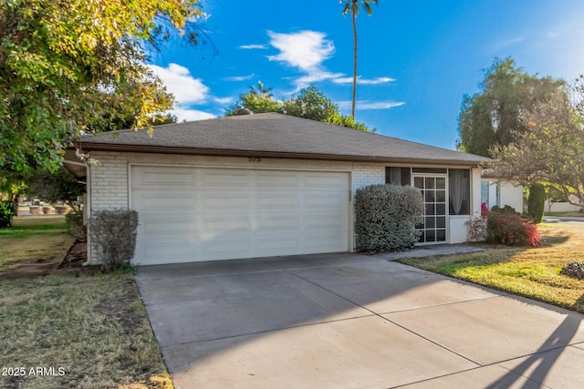 ranch-style home featuring a garage