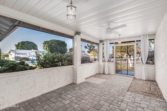 view of patio / terrace featuring ceiling fan