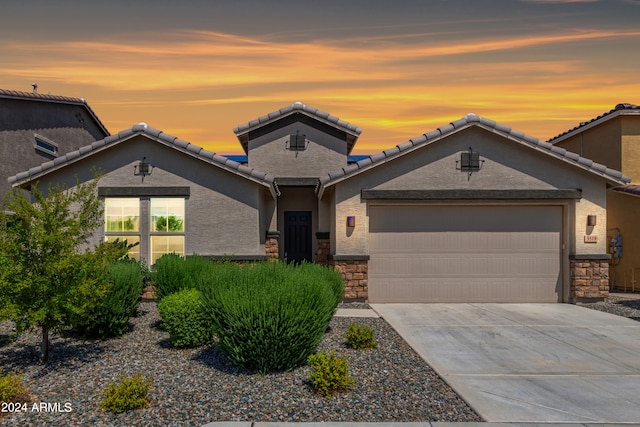 view of front of property featuring a garage