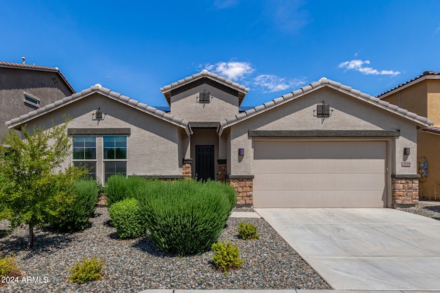 view of front of home featuring a garage