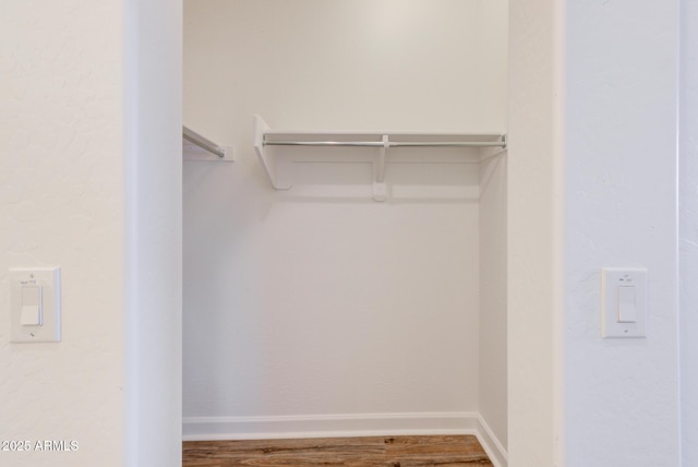 1367 S Country Club Dr S Unit 1125, Mesa, AZ 85210 - spacious closet with wood finished floors
