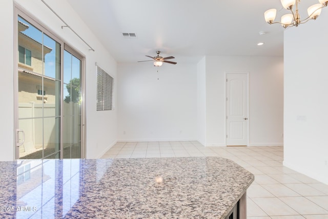1367 S Country Club Dr S Unit 1125, Mesa, AZ 85210 - spare room with light tile patterned floors, a ceiling fan, a chandelier, and recessed lighting