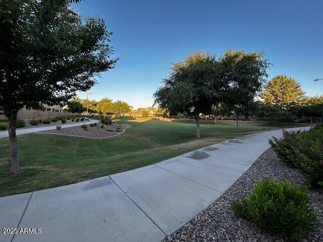 1350 S Greenfield Rd Unit 1219, Mesa, AZ 85206 - view of community featuring a lawn