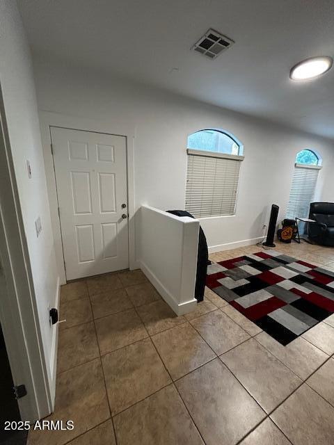 1350 S Greenfield Rd Unit 1219, Mesa, AZ 85206 - entrance foyer with tile patterned flooring and healthy amount of natural light