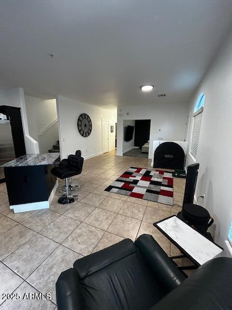1350 S Greenfield Rd Unit 1219, Mesa, AZ 85206 - living area with light tile patterned floors and stairs