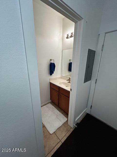 1350 S Greenfield Rd Unit 1219, Mesa, AZ 85206 - bathroom with vanity, electric panel, and tile patterned floors