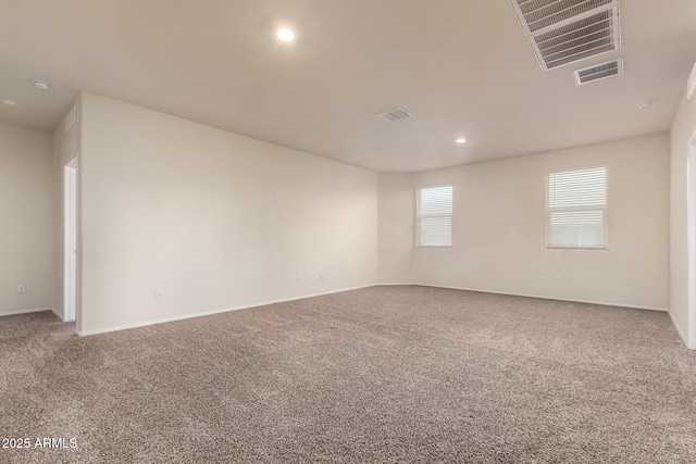 spare room with carpet floors