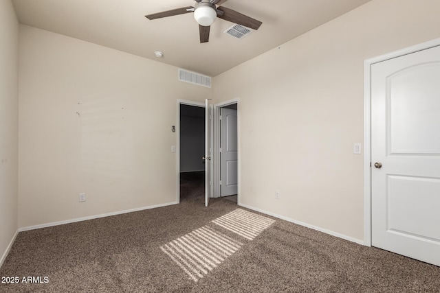 unfurnished bedroom featuring ceiling fan and carpet