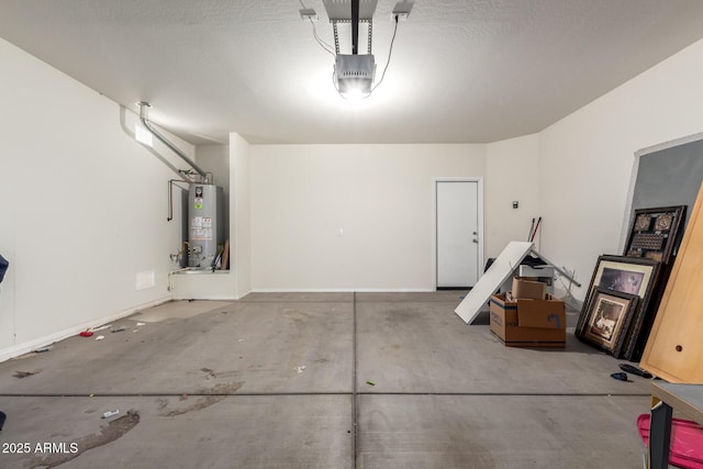 garage featuring gas water heater and a garage door opener