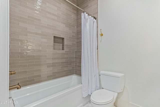 bathroom featuring toilet and shower / bath combo with shower curtain