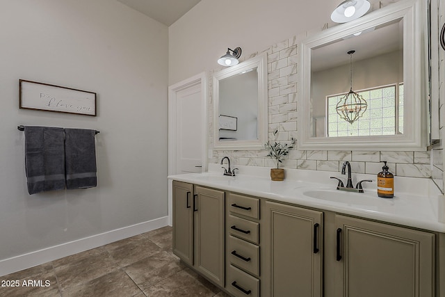 3662 E Megan St, Gilbert, AZ 85295 - full bathroom with baseboards, a sink, a chandelier, and double vanity