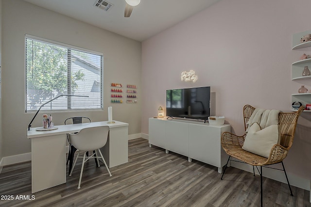 3662 E Megan St, Gilbert, AZ 85295 - home office with baseboards, a ceiling fan, wood finished floors, and visible vents