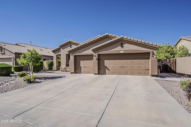 3662 E Megan St, Gilbert, AZ 85295 - view of front of property with a garage, stucco siding, fence, and concrete driveway