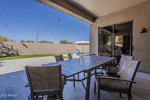 3662 E Megan St, Gilbert, AZ 85295 - view of patio / terrace featuring a fenced backyard and outdoor dining space