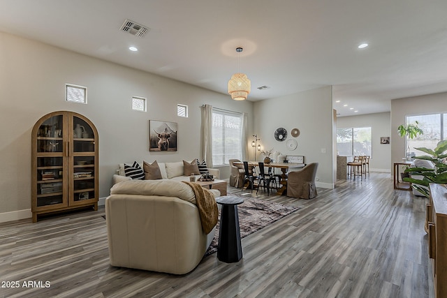 3662 E Megan St, Gilbert, AZ 85295 - living room with recessed lighting, baseboards, visible vents, and wood finished floors