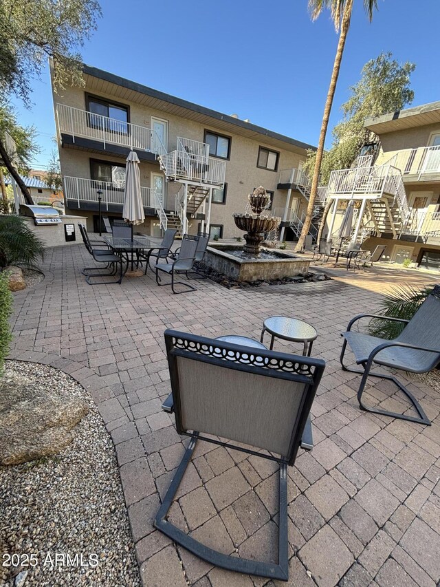 view of patio featuring stairs