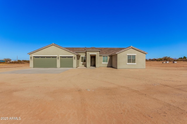 view of front of home featuring a garage