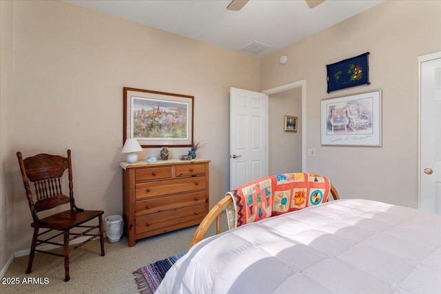 bedroom with ceiling fan and carpet