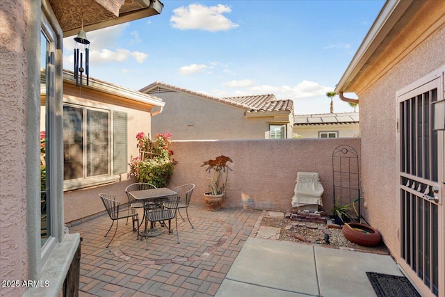 view of patio / terrace featuring outdoor dining area and a fenced backyard