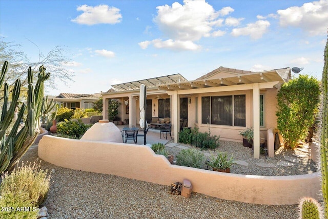 rear view of property with a patio