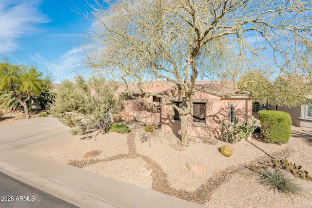 view of front of property featuring stucco siding