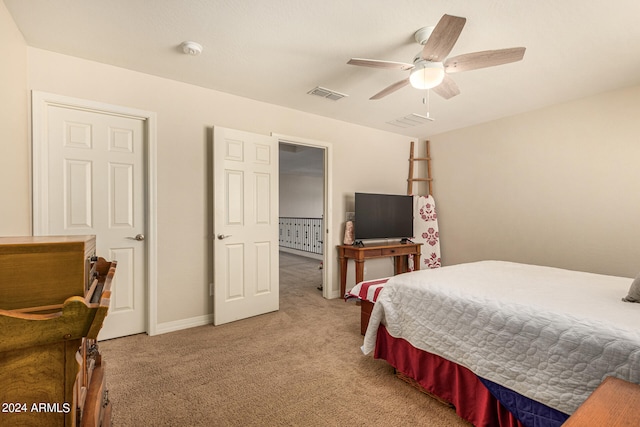 bedroom featuring ceiling fan and carpet flooring