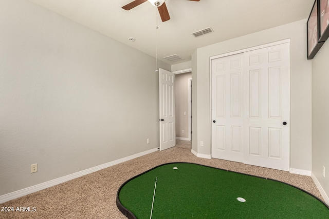 unfurnished bedroom featuring a closet, carpet, and ceiling fan