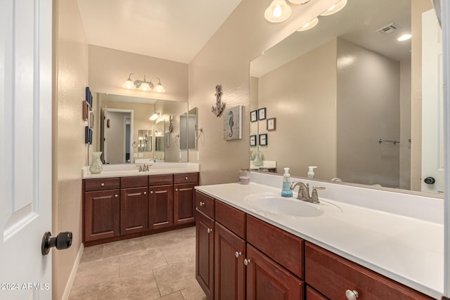 bathroom featuring tile patterned floors and vanity