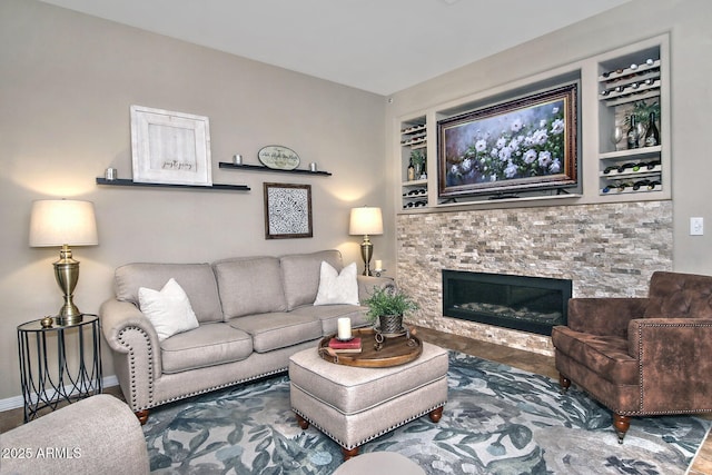 living room featuring built in shelves