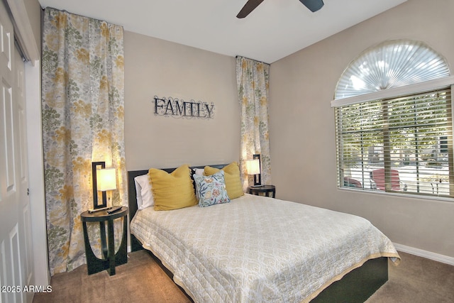 carpeted bedroom featuring ceiling fan