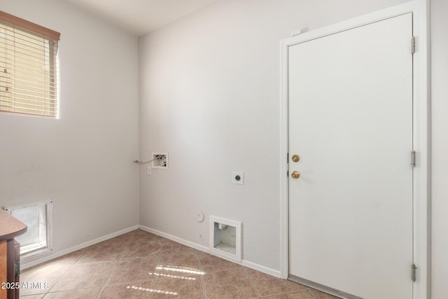washroom with hookup for a gas dryer, hookup for a washing machine, laundry area, hookup for an electric dryer, and light tile patterned floors