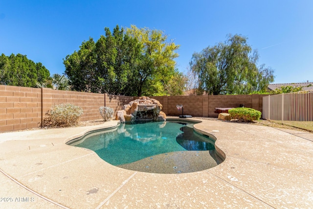 view of pool featuring a fenced backyard, a patio area, and a fenced in pool