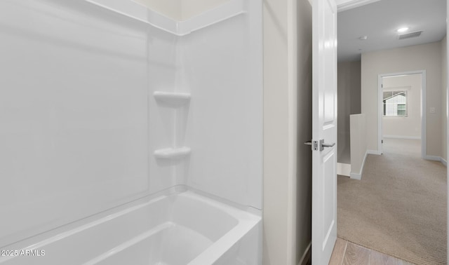 bathroom featuring bathing tub / shower combination