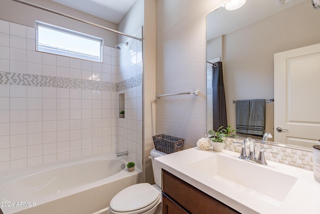full bath featuring shower / washtub combination, toilet, and vanity